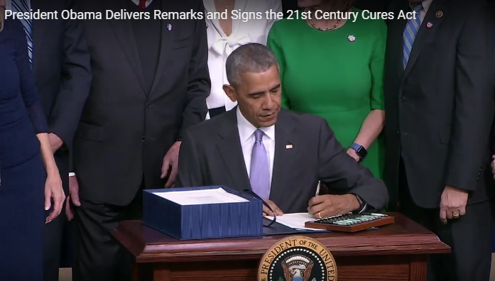 obama-signing-cures-act